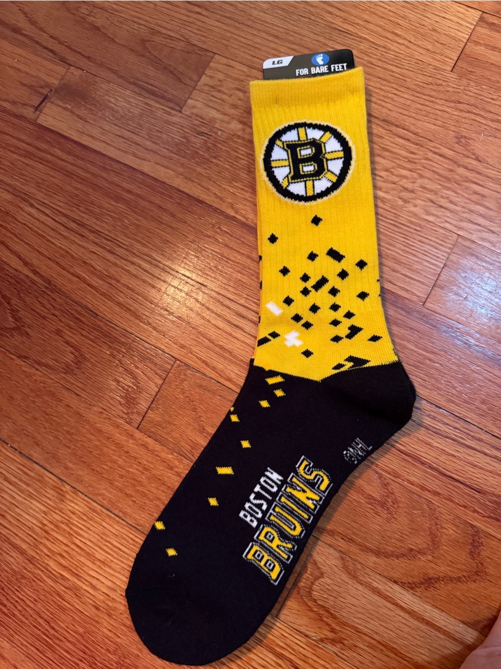 Boston Bruins socks from For Bare Feet 
Men's Yellow & Black Crew Socks
